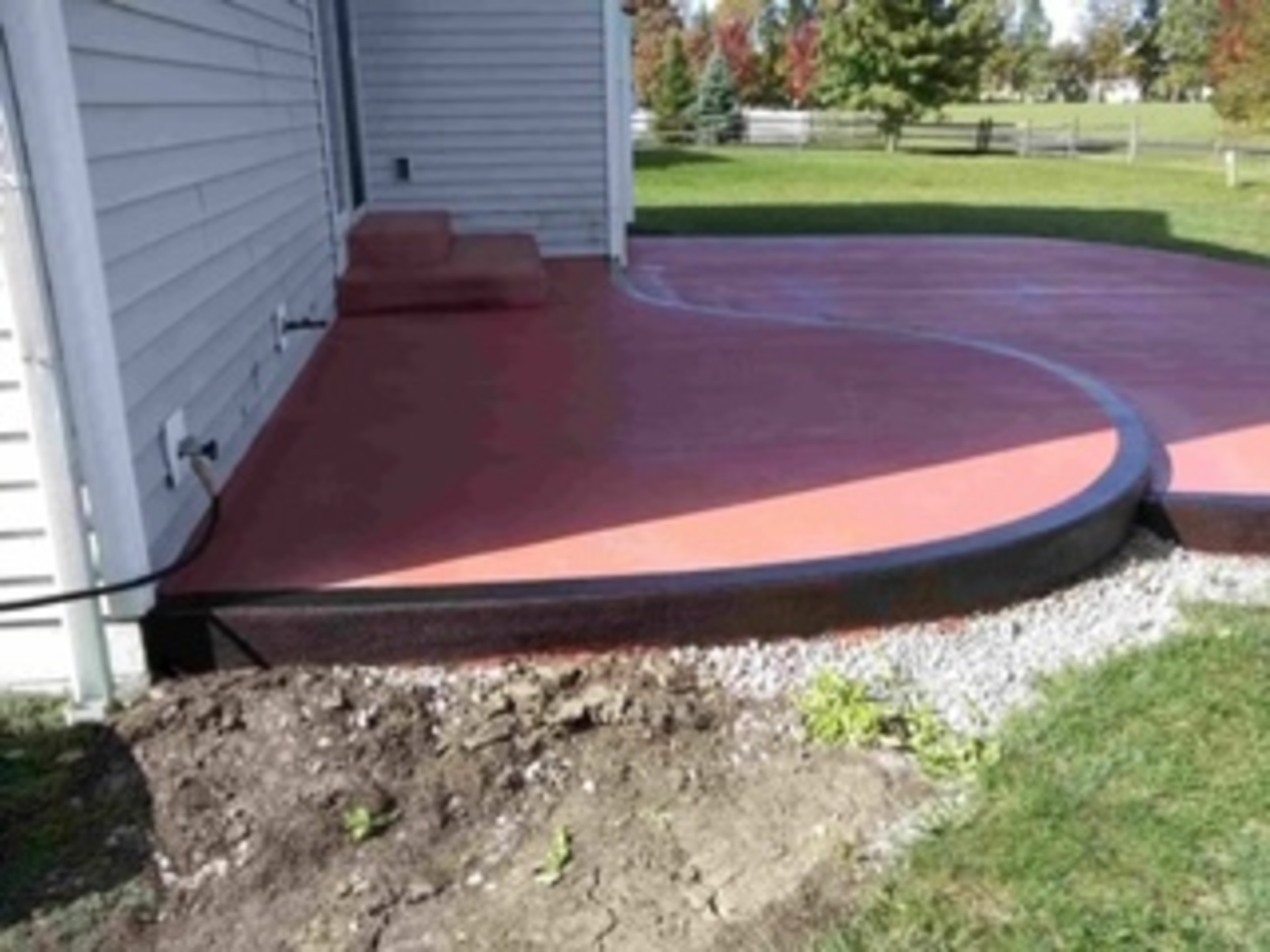 multicolored patio done by concrete contractor