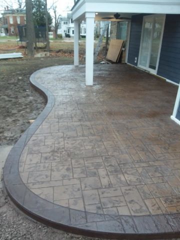 carpenter stamped patio concrete pour